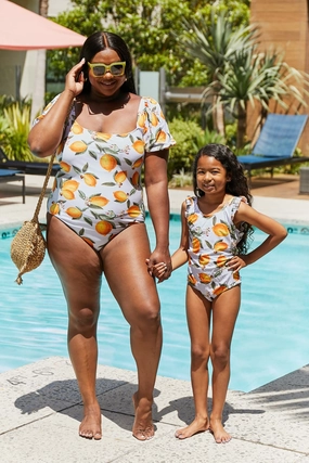 Marina West Swim Salty Air Puff Sleeve One-Piece in Citrus Orange one piece swimsuits for women, full coverage one piece swimwear