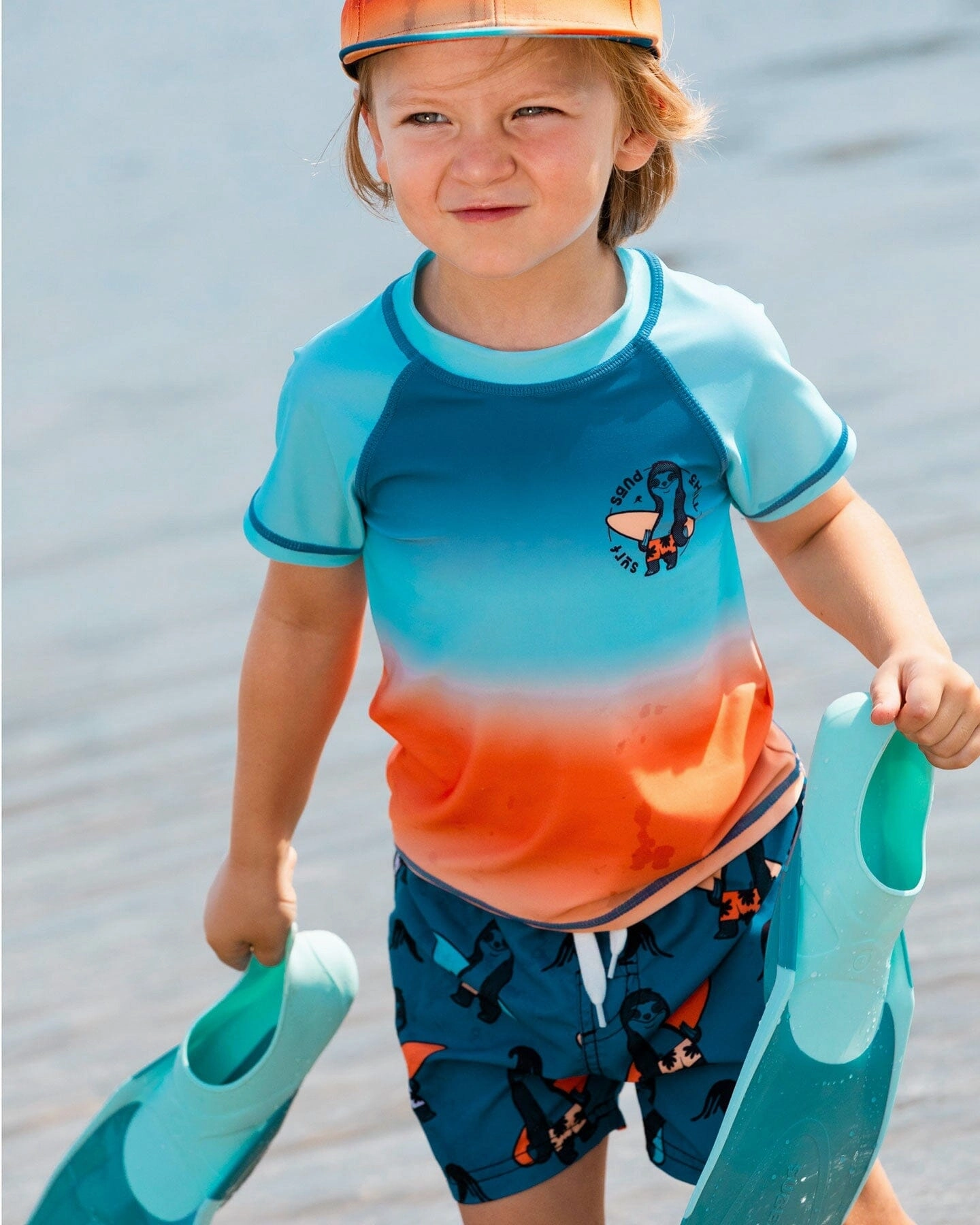 Printed Swim Trunks Orange Sloths On Navy Blue